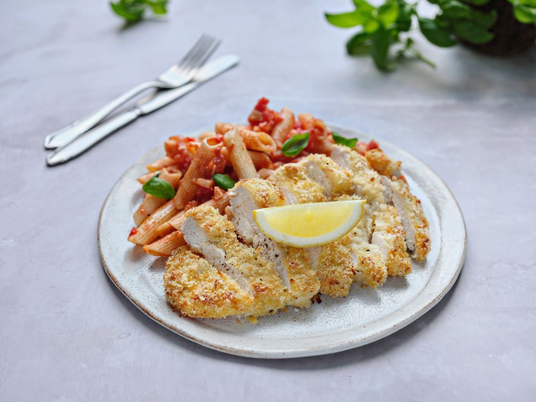 Chicken Schnitzel with Pasta and Spicy Tomato Sauce