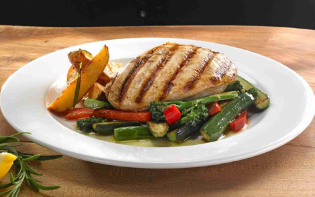Grilled Chicken with Potato Wedges and Stir-Fry Vegetables