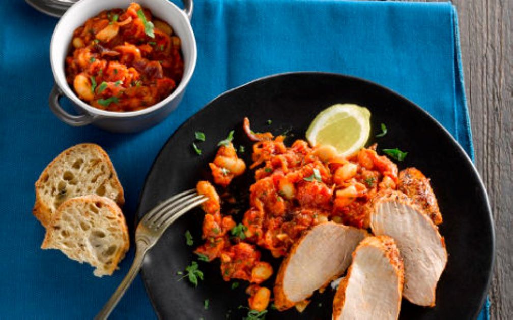 Pork Steak Roasted with Tomatoes, Red Onion and Beans