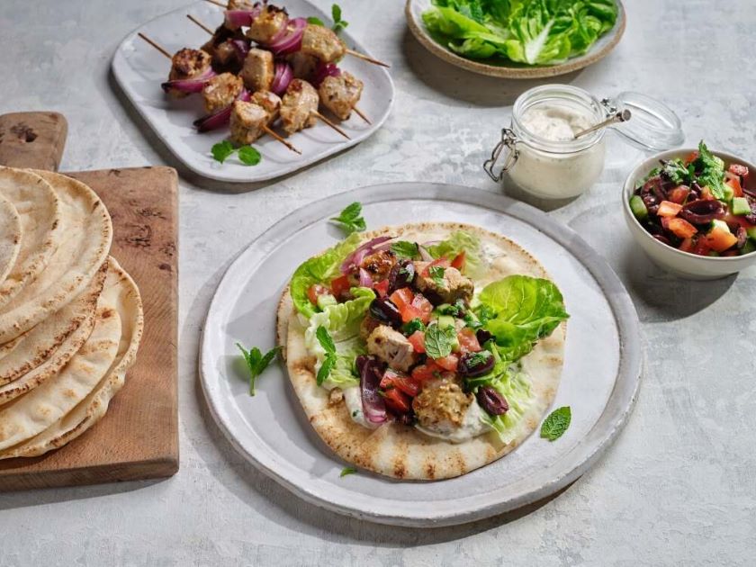   Tahini Pork Skewers with Flat Breads and Salad